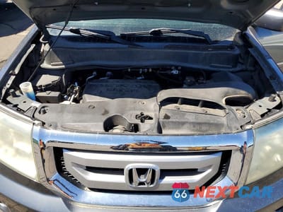 Zdjęcie 11 z 12 samochodu: 2010 HONDA PILOT TOURING VIN:5FNYF4H83AB021401 - miniatura