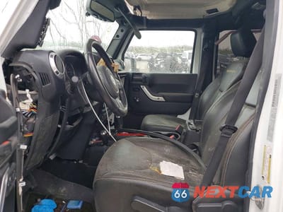 Zdjęcie 7 z 11 samochodu: 2016 JEEP WRANGLER UNLIMITED SAHARA VIN:1C4BJWEGXGL107869 - miniatura