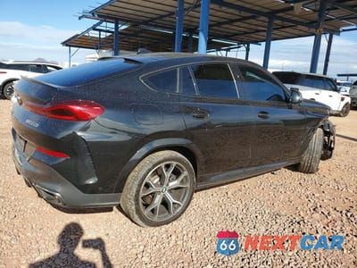 Trzecie zdjęcie samochodu z tyłu: 2021 BMW X6 M50I VIN:5UXCY8C07M9G38166 - miniatura