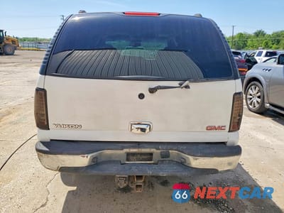 Zdjęcie 6 z 13 samochodu: 2004 GMC YUKON VIN:1GKEC13Z44R218896 - miniatura