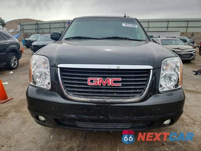 Piąte zdjęcie samochodu w środku: 2011 GMC YUKON SLT VIN:1GKS2CE06BR129053 - miniatura