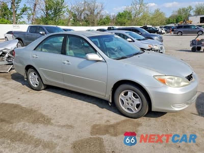 Czwarte zdjęcie samochodu z boku: 2002 TOYOTA CAMRY VIN:4T1BE32K22U035818 - miniatura