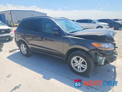Czwarte zdjęcie samochodu z boku: 2012 HYUNDAI SANTA FE GLS VIN:5XYZG3AB7CG169483 - miniatura