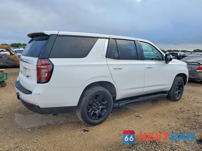 Trzecie zdjęcie samochodu z tyłu: 2022 CHEVROLET TAHOE C1500 VIN:1GNSCLED9NR247864 - miniatura