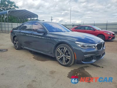 Czwarte zdjęcie samochodu z boku: 2018 BMW 750 XI VIN:WBA7B0C57JG527278 - miniatura