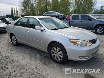 Czwarte zdjęcie samochodu z boku: 2004 TOYOTA CAMRY XLE VIN:4T1BE30K94U379670 - miniatura