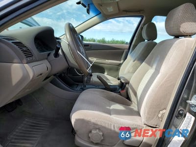 Zdjęcie 7 z 12 samochodu: 2003 TOYOTA CAMRY LE VIN:JTDBE32K730146698 - miniatura