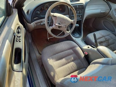 Zdjęcie 8 z 11 samochodu: 1997 FORD MUSTANG VIN:1FALP404XVF207704 - miniatura