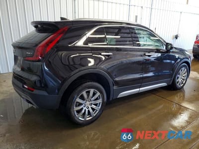 Trzecie zdjęcie samochodu z tyłu: 2020 CADILLAC XT4 PREMIUM LUXURY VIN:1GYFZDR44LF055088 - miniatura