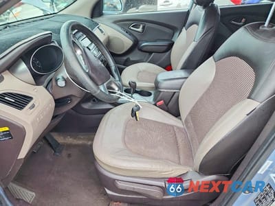 Zdjęcie 7 z 13 samochodu: 2010 HYUNDAI TUCSON GLS VIN:KM8JUCAC6AU053715 - miniatura