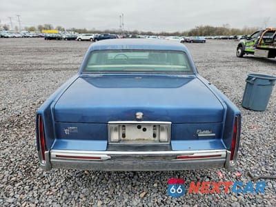 Zdjęcie 6 z 12 samochodu: 1992 CADILLAC DEVILLE VIN:1G6CD53B2N4265517 - miniatura