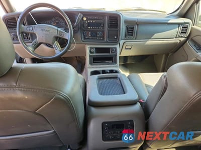 Zdjęcie 8 z 12 samochodu: 2004 GMC YUKON VIN:1GKEC13Z04J279984 - miniatura