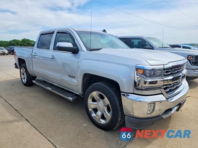 Czwarte zdjęcie samochodu z boku: 2016 CHEVROLET SILVERADO C1500 LTZ VIN:3GCPCSECXGG212673 - miniatura