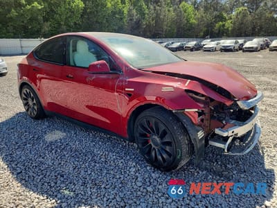 Czwarte zdjęcie samochodu z boku: 2021 TESLA MODEL Y VIN:5YJYGDEF5MF305696 - miniatura