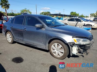 Czwarte zdjęcie samochodu z boku: 2014 VOLKSWAGEN JETTA SE VIN:3VWD17AJ5EM420952 - miniatura