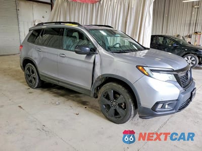 Czwarte zdjęcie samochodu z boku: 2020 HONDA PASSPORT ELITE VIN:5FNYF8H00LB006617 - miniatura