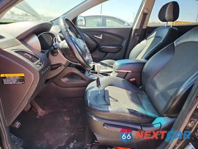 Zdjęcie 7 z 12 samochodu: 2013 HYUNDAI TUCSON GLS VIN:KM8JUCAC3DU678934 - miniatura