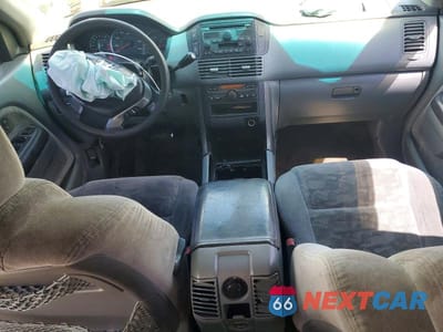 Zdjęcie 8 z 12 samochodu: 2004 HONDA PILOT EX VIN:2HKYF184X4H580400 - miniatura