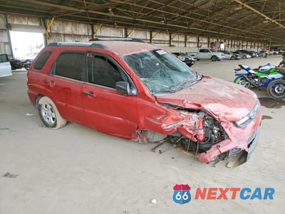 Czwarte zdjęcie samochodu z boku: 2010 KIA SPORTAGE LX VIN:KNDKGCA36A7700242 - miniatura