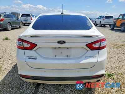 Zdjęcie 6 z 12 samochodu: 2014 FORD FUSION TITANIUM PHEV VIN:3FA6P0SU1ER356802 - miniatura