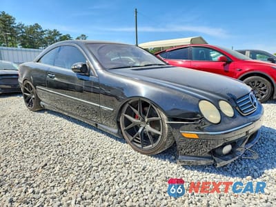 Czwarte zdjęcie samochodu z boku: 2003 MERCEDES-BENZ CL 500 VIN:WDBPJ75JX3A034725 - miniatura