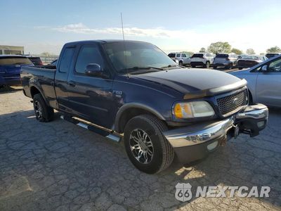 Czwarte zdjęcie samochodu z boku: 2002 FORD F150 VIN:2FTRX18W32CA68855 - miniatura