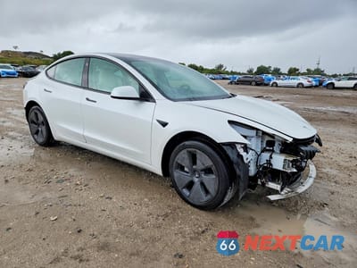 Czwarte zdjęcie samochodu z boku: 2023 TESLA MODEL 3 VIN:5YJ3E1EA8PF573813 - miniatura