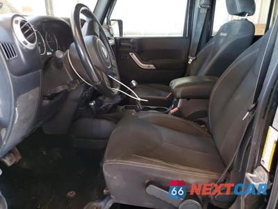 Zdjęcie 7 z 12 samochodu: 2017 JEEP WRANGLER UNLIMITED SAHARA VIN:1C4BJWEG2HL752162 - miniatura