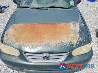 Zdjęcie 11 z 12 samochodu: 2001 TOYOTA COROLLA LE VIN:2T1BR12E31C434062 - miniatura