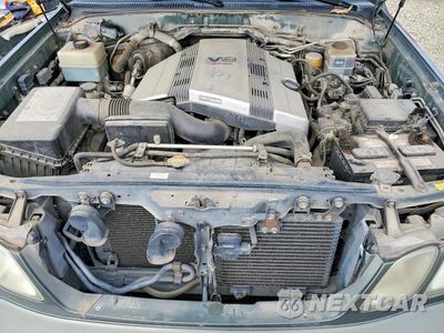 Zdjęcie 12 z 13 samochodu: 2006 LEXUS LX 470 VIN:JTJHT00W164015619 - miniatura