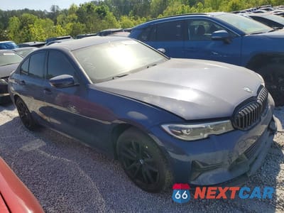 Czwarte zdjęcie samochodu z boku: 2019 BMW 330XI VIN:WBA5R7C51KFH28132 - miniatura