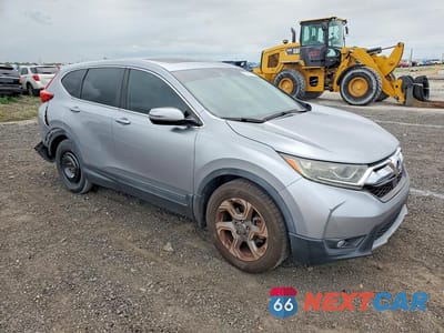 Czwarte zdjęcie samochodu z boku: 2017 HONDA CR-V EXL VIN:7FARW1H80HE004878 - miniatura