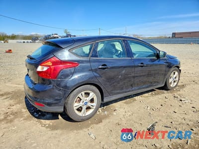 Trzecie zdjęcie samochodu z tyłu: 2012 FORD FOCUS SE VIN:1FAHP3K2XCL365597 - miniatura