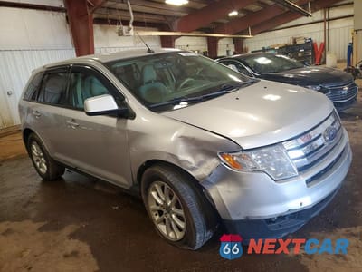 Czwarte zdjęcie samochodu z boku: 2010 FORD EDGE SEL VIN:2FMDK3JC1ABB17183 - miniatura
