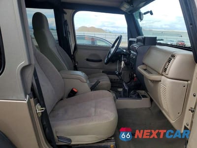 Zdjęcie 10 z 12 samochodu: 2005 JEEP WRANGLER X VIN:1J4FA39S75P310815 - miniatura