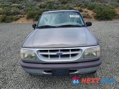 Piąte zdjęcie samochodu w środku: 1996 FORD EXPLORER VIN:1FMDU34X0TZA79406 - miniatura
