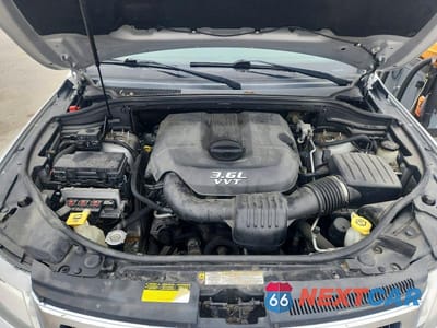 Zdjęcie 11 z 12 samochodu: 2012 JEEP GRAND CHEROKEE LAREDO VIN:1C4RJFAG4CC108692 - miniatura