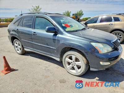 Czwarte zdjęcie samochodu z boku: 2007 LEXUS RX 350 VIN:2T2GK31U07C016304 - miniatura