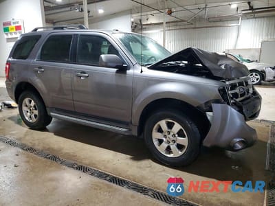 Czwarte zdjęcie samochodu z boku: 2011 FORD ESCAPE LIMITED VIN:1FMCU9EG0BKA52615 - miniatura