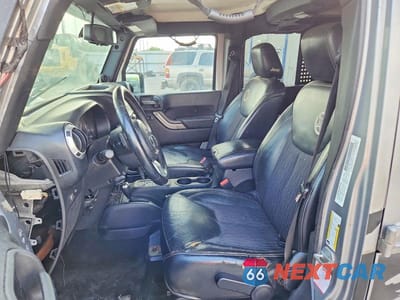 Zdjęcie 7 z 12 samochodu: 2013 JEEP WRANGLER UNLIMITED SPORT VIN:1C4BJWDG4DL628857 - miniatura