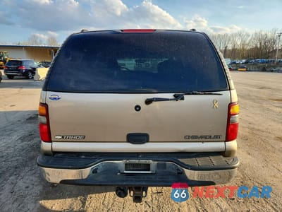Zdjęcie 6 z 12 samochodu: 2003 CHEVROLET TAHOE C1500 VIN:1GNEC13ZX3R135877 - miniatura