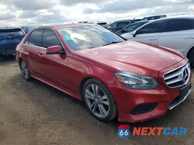 Czwarte zdjęcie samochodu z boku: 2014 MERCEDES-BENZ E 350 4MATIC VIN:WDDHF8JB9EB002508 - miniatura