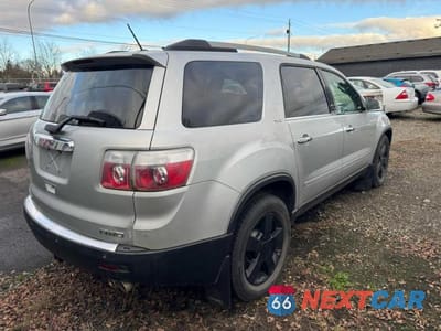 Czwarte zdjęcie samochodu z boku: 2010 GMC ACADIA SLT-1 VIN:1GKLVMEDXAJ173154 - miniatura