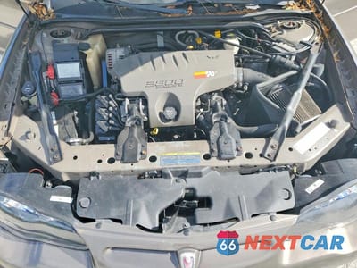 Zdjęcie 11 z 12 samochodu: 2003 CHEVROLET MONTE CARLO SS VIN:2G1WX12K739409450 - miniatura