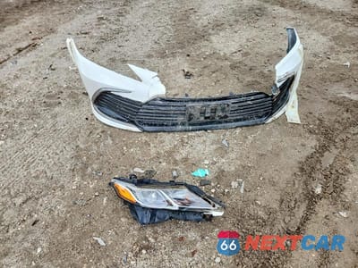 Zdjęcie 12 z 13 samochodu: 2022 TOYOTA CAMRY LE VIN:4T1C11AK2NU060079 - miniatura