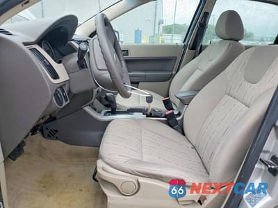 Zdjęcie 7 z 11 samochodu: 2009 FORD FOCUS SE VIN:1FAHP35N89W170868 - miniatura