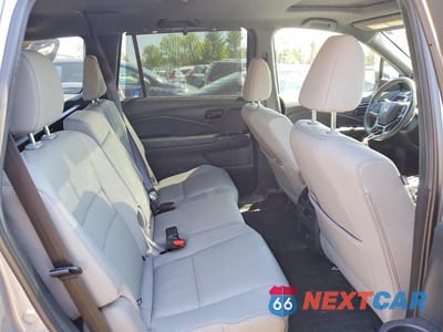 Zdjęcie 10 z 12 samochodu: 2022 HONDA PASSPORT ELITE VIN:5FNYF8H0XNB011021 - miniatura