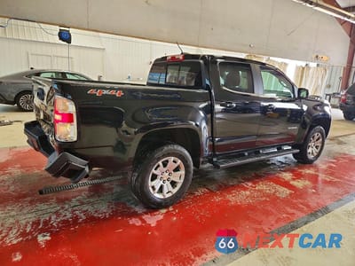 Trzecie zdjęcie samochodu z tyłu: 2019 CHEVROLET COLORADO LT VIN:1GCGTCENXK1306504 - miniatura