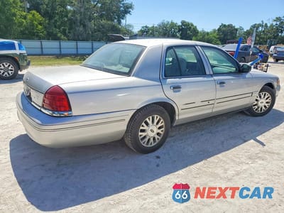 Trzecie zdjęcie samochodu z tyłu: 2004 FORD CROWN VICTORIA LX VIN:2FDFP74W64X185099 - miniatura