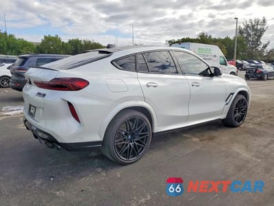 Trzecie zdjęcie samochodu z tyłu: 2020 BMW X6 M VIN:5YMCY0C09L9B05681 - miniatura
